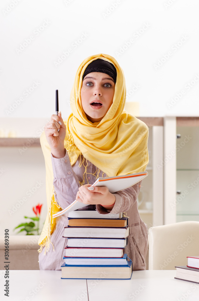 Female student in hijab preparing for exams Female student in hijab preparing for exams