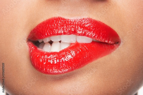 Woman Biting Red Lips