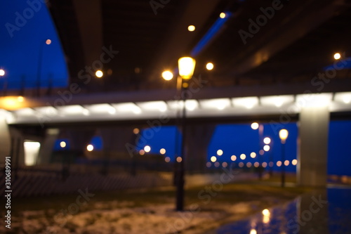 Blurry city lights in winter evening