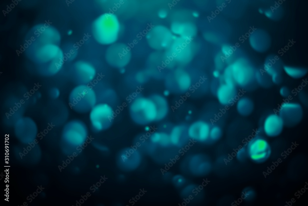 Blue abstract christmas bokeh light on the background Blue abstract christmas bokeh light on the background
