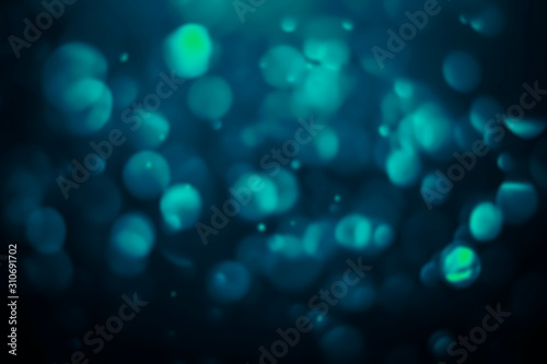 Blue abstract christmas bokeh light on the background