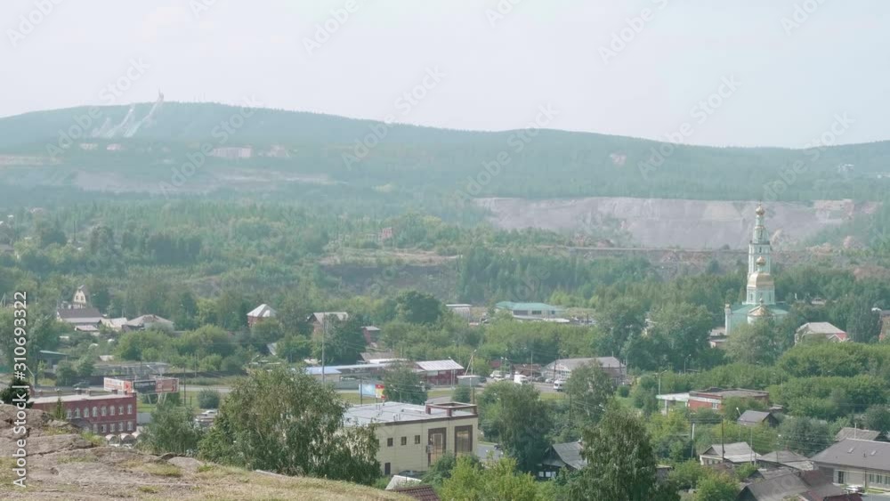 Quarry and mines are near the city with metallurgic industry.
