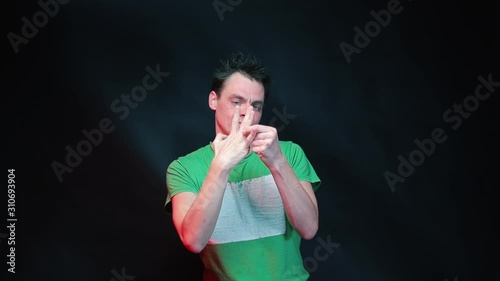 A married man takes off a wedding ring from his finger.