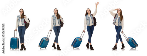 Smiling caucasian girl walking with suitcase isolated on white