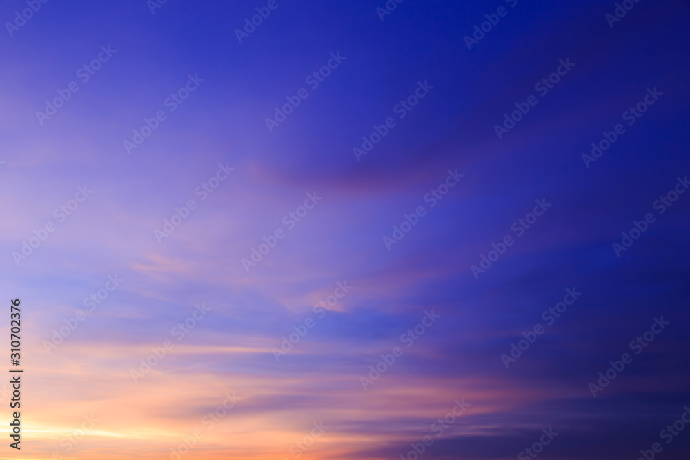 Abstract fantasy softly clouds background, Golden sunlight cloudy with colorful highlight on blue sky twilight sunset