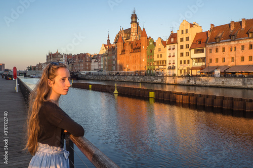 Canvas Print young woman on the bridge in gdansk