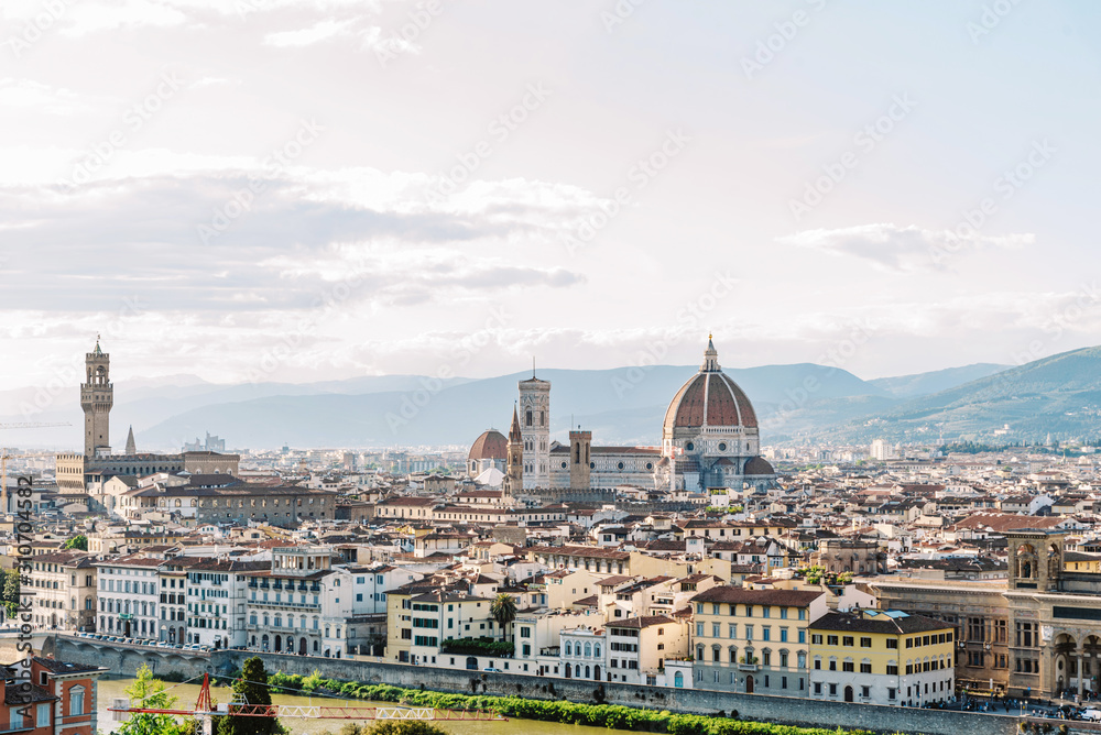 A large panorama of the Italian city. Many beautiful historic houses and showplaces in Florence. Travelling Europe