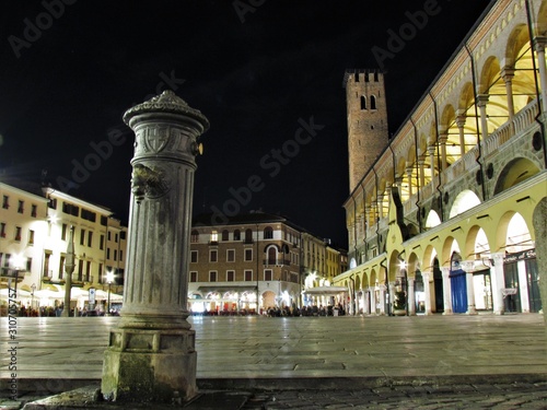 Padova, Italy - October 14th, 2019: The Beautiful Streets of Padova (Padua), in Italy, at night with its magical arcades (Portici) and its beautiful squares Piazza delle erbe e Piazza della Frutta