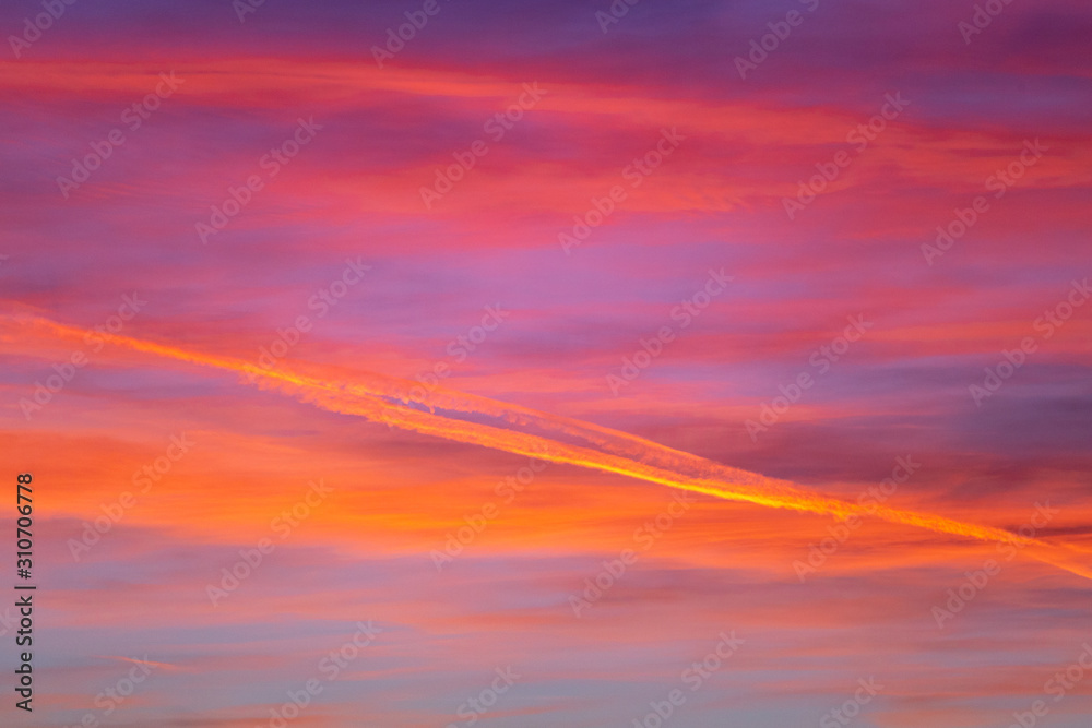 Colorful sky cloud textures with chem trails during sunset in Zagreb, Croatia
