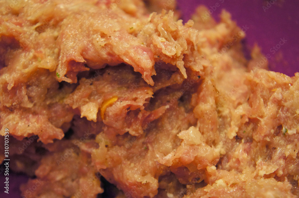 Pork minced meat for cooking cutlets and meatballs in a bowl. Pork minced meat for cooking cutlets and meatballs in a bowl.