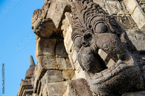 Detail of a beautiful figure of the Borobudur temple. Indonesia