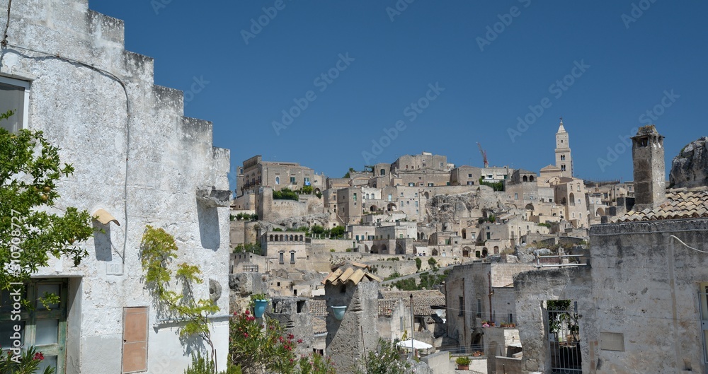 Matera is a city located on a rocky outcrop in Basilicata, in Southern Italy. It includes the area of the Sassi, a complex of Cave Houses excavated in the mountain.