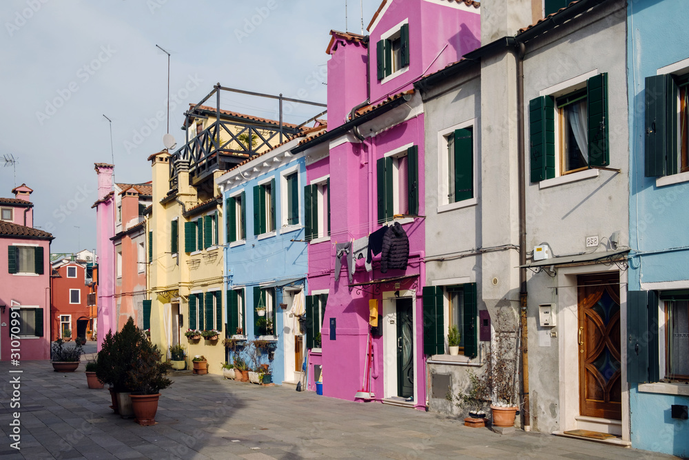 Traditional Italian houses with wooden shutters