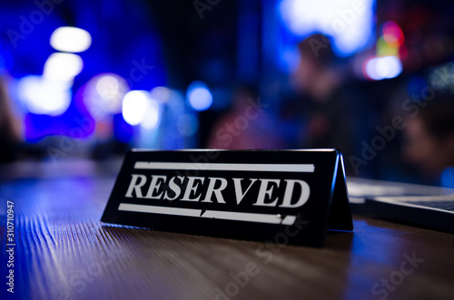 Table reservation sign close up. Ready for a party