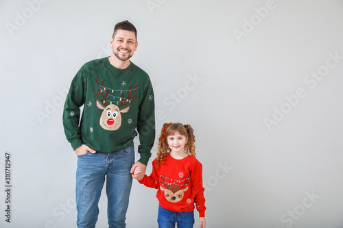 Cute little girl with fathe...