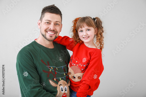 Cute little girl with fathe...