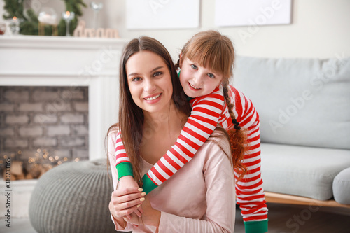 Little girl with mother at ...