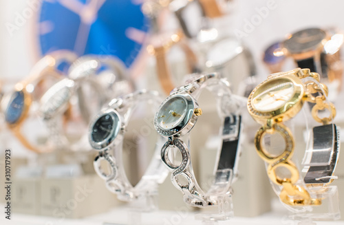 Luxurious Watches In A Store Stand