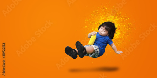 Happy Cute Asian children drink water on colorful background, The child feels fresh.