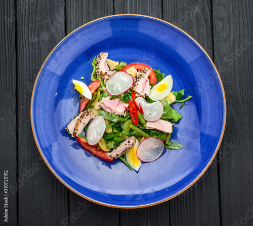 meat salad with vegetable and sesame. spanish kitchen