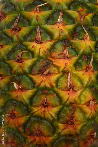 The texture of the peel of the pineapple. Close-up of fruit peel.