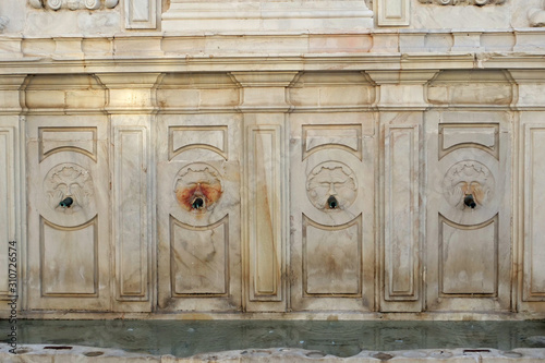 Closeup of the fountain of Felipe the 2nd & Fernando the 6th in the Spanish town of Velez Malaga