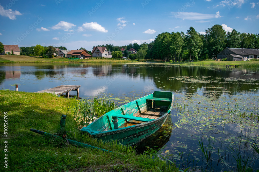 Wooden boat on a lake outside Ignalina, Lithuania
