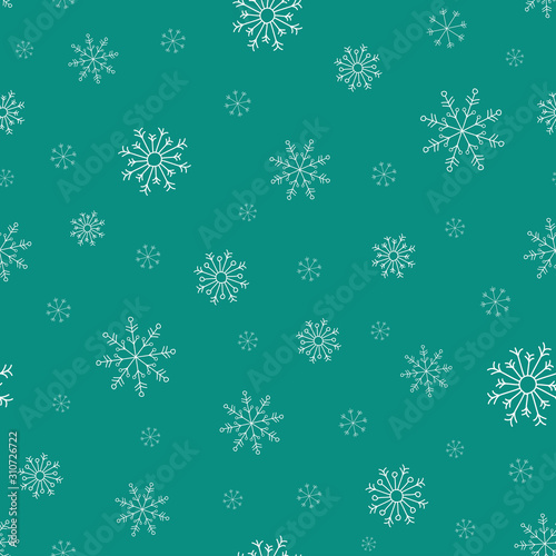 Hand drawn white snowflakes on turquoise background. winter Christmas seamless pattern. New Year backdrop.
