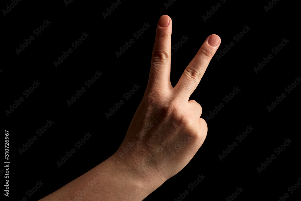 Numbers 2 in sign language. gesture number 2 with hand sign. women hand sign isolated on black background. finger pointer Numbers 2 in sign language. gesture number 2 with hand sign. women hand sign isolated on black background. finger pointer