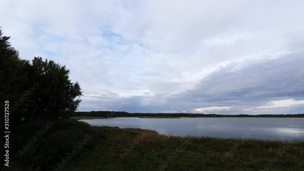 Nimbostratus clouds dawning the landscape of Baryczy river poland time lapse Nimbostratus clouds dawning the landscape of Baryczy river poland time lapse