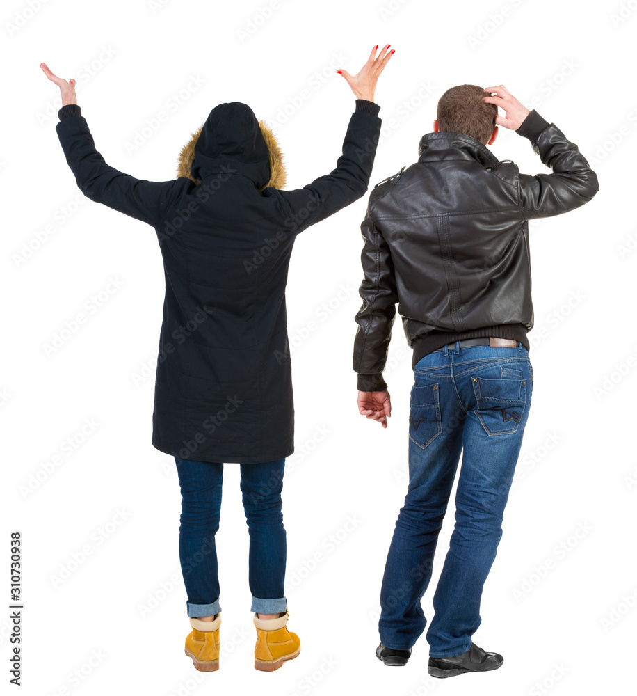 Back view of couple in winter jacket. Back view of couple in winter jacket.