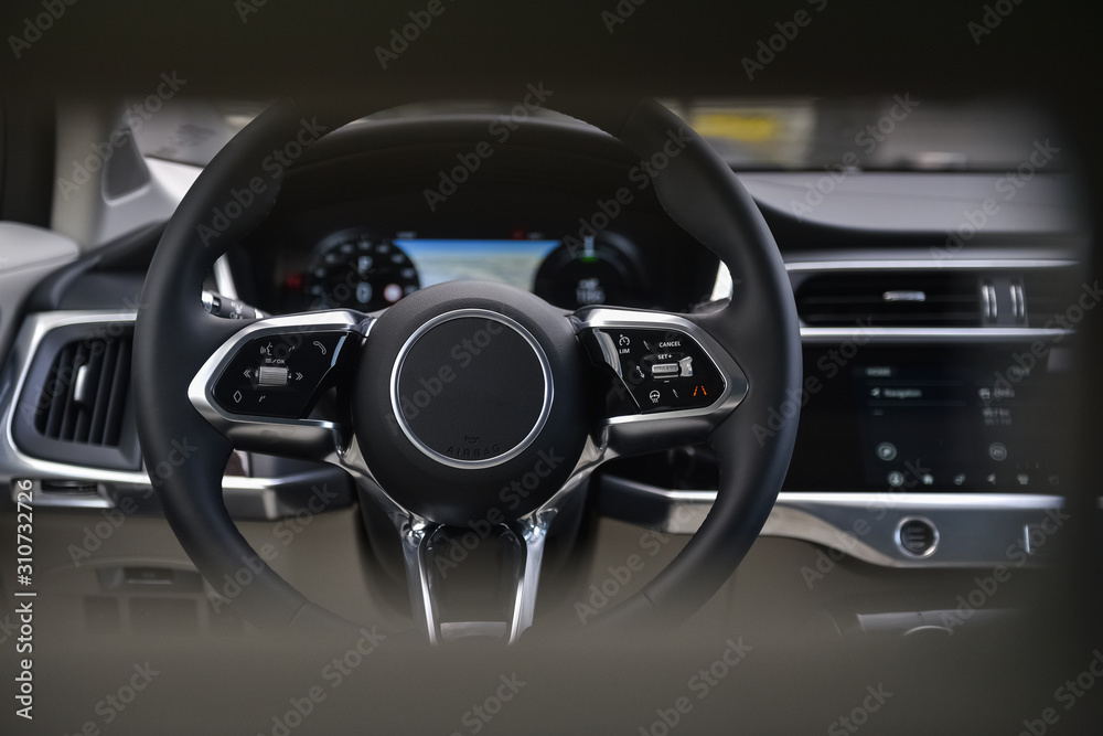 Steering wheel and dashboard in a car