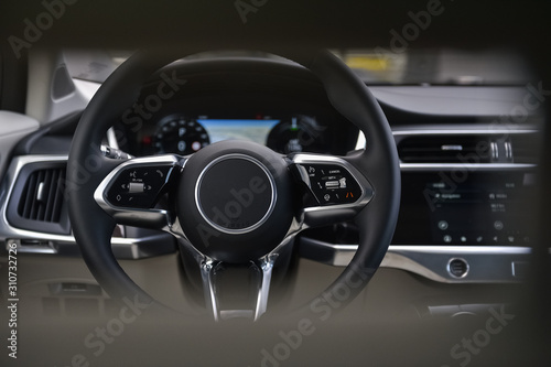 Steering wheel and dashboard in a car © vpilkauskas