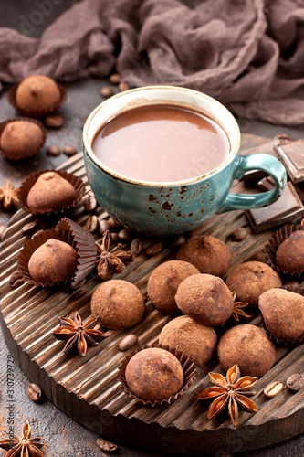 Composition with hot chocolate drink and sweet truffles