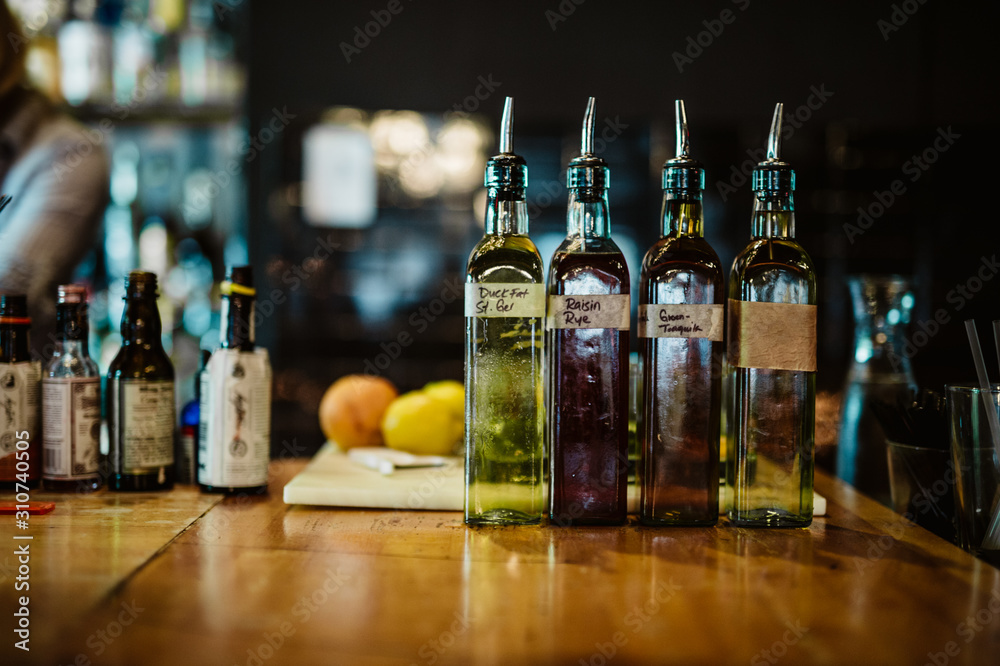 Liquor infusions on a bartop Liquor infusions on a bartop