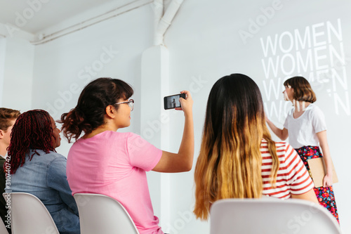 People in a conference about feminism.