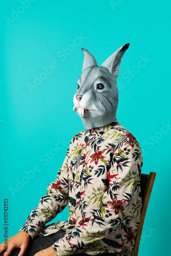 man with a rabbit mask photo