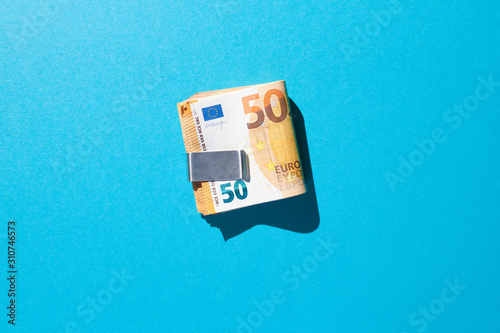 Euro bills in metal clip