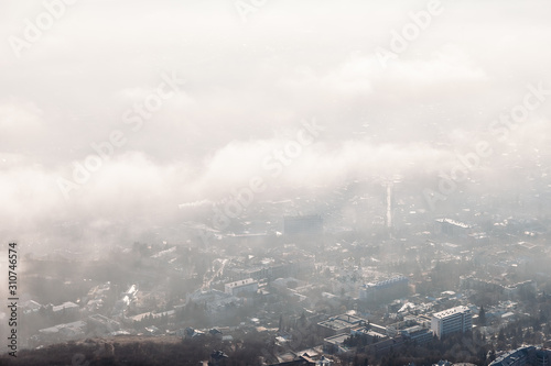 aerial view of the city through the clouds