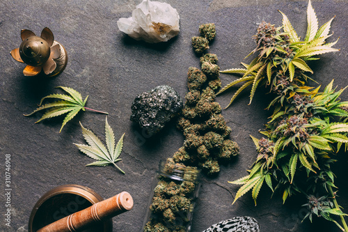 Overhead view of cannabis buds on table photo