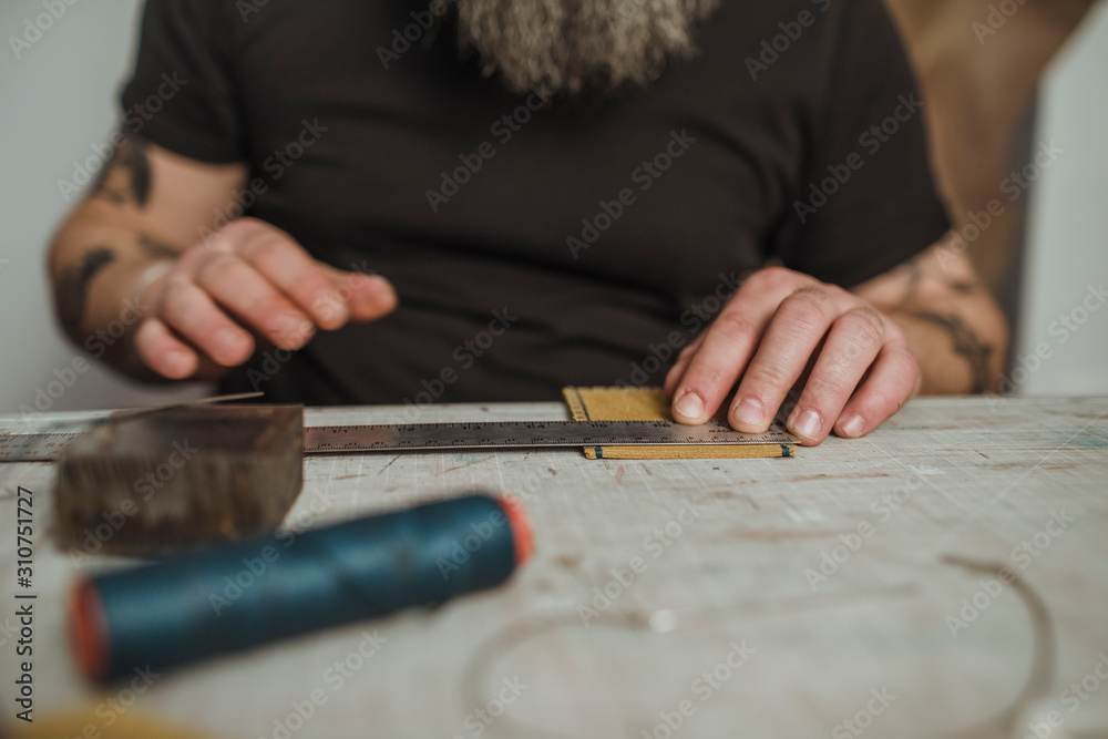 Man Working At Manufacture Of Craft Leather Products Man Working At Manufacture Of Craft Leather Products
