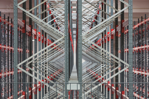 Empty shelves into an industrial warehouse photo