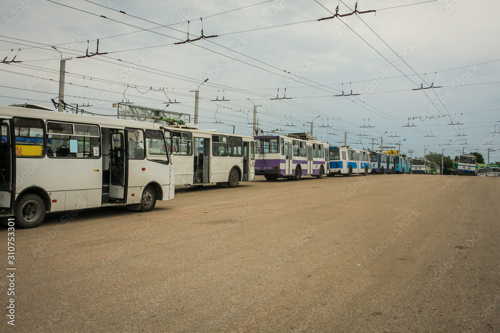 Station with electric buses, trolleybuses in Sevastopol, Ukraine. Parking of buses driven by electricity in Ukraine.