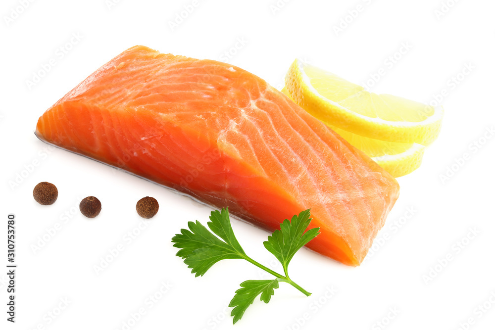 Red fish. Raw salmon fillet with parsley, peppercorns and lemon isolate on white background Red fish. Raw salmon fillet with parsley, peppercorns and lemon isolate on white background