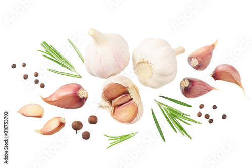 garlic with rosemary, peppercorns and allspice isolated on white background. top view