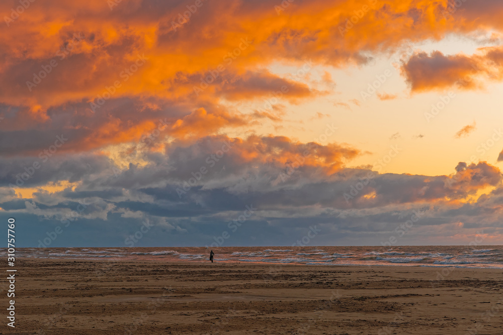 Orange sky at sunset. Beautiful sea sunset on the Baltic Sea.