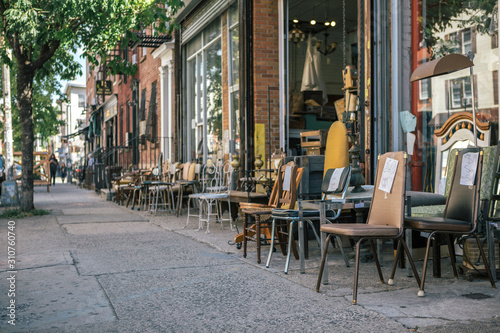 Street View of Commercial Street in Williamsburg Brooklyn with Old Chair of Junk Shop on Sidewalk