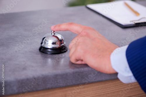 Hotel reception bell at the counter