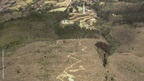 Aerial shot of Villa de Leyva during Daytime. Tiltup 4k. photo