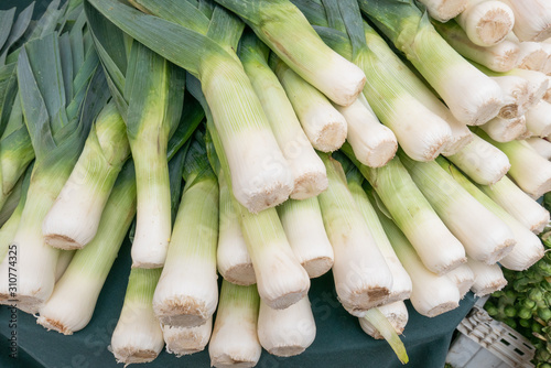 Pile of green and white fresh leeks